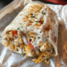 Chicken Bell Pepper Ranch Burritos wrapped in foil, filled with grilled chicken and colorful bell peppers.
