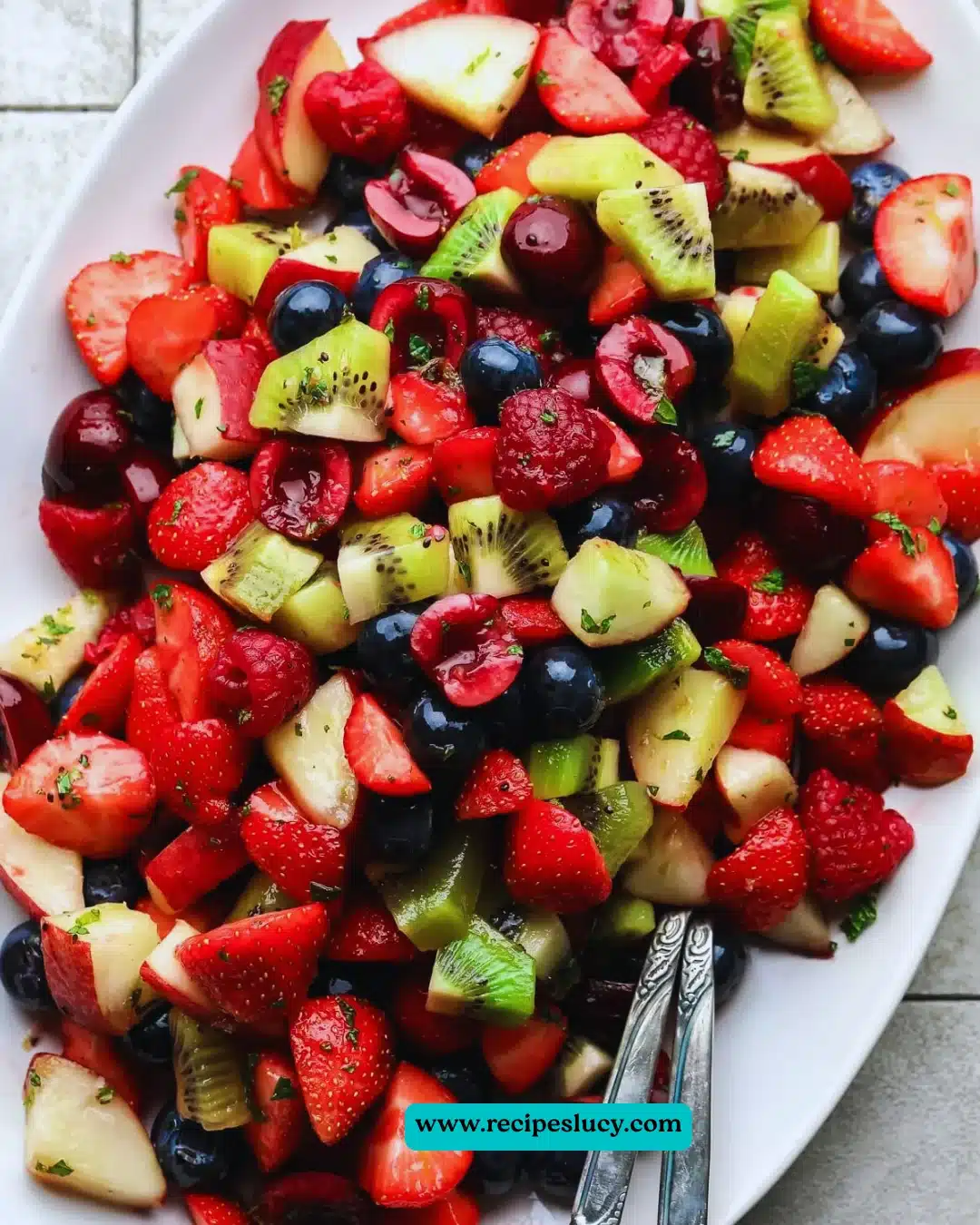 Colorful fruit salad with a variety of fresh fruits in a bowl