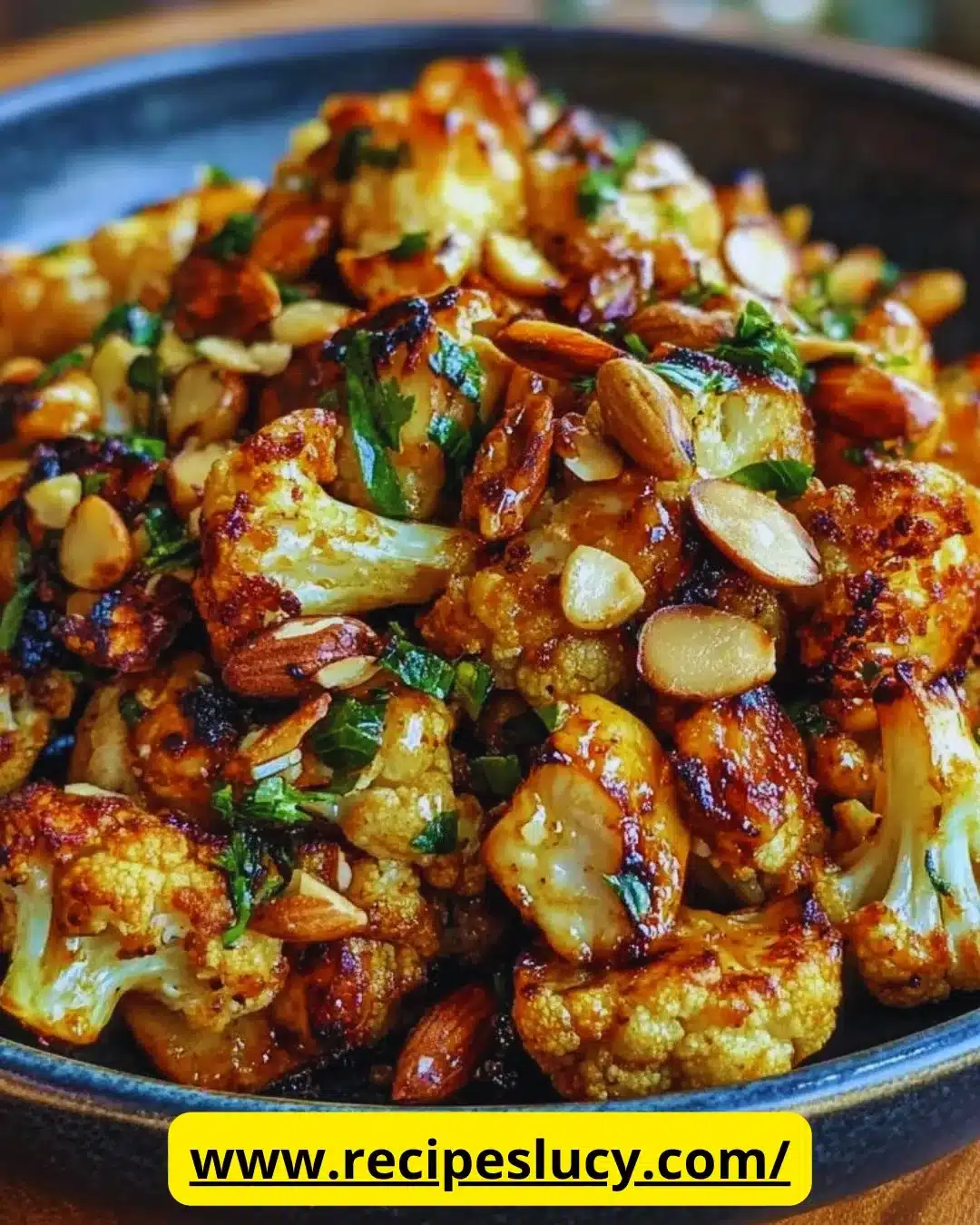Plate of delicious Honey Cauliflower garnished with herbs