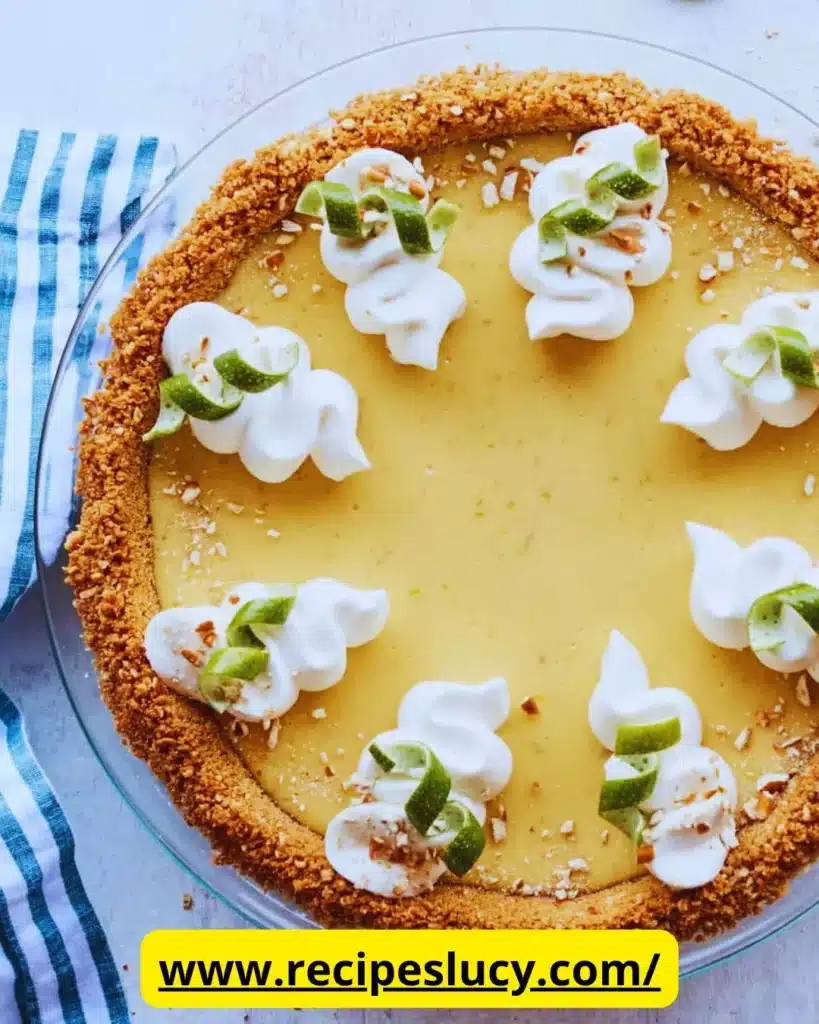 Delicious salted key lime pie served with a slice removed, perfect summer dessert.