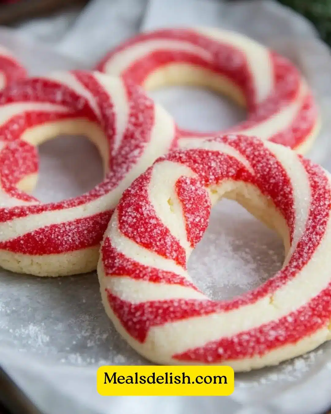 Homemade Candy Cane Cookies with festive red and white swirls