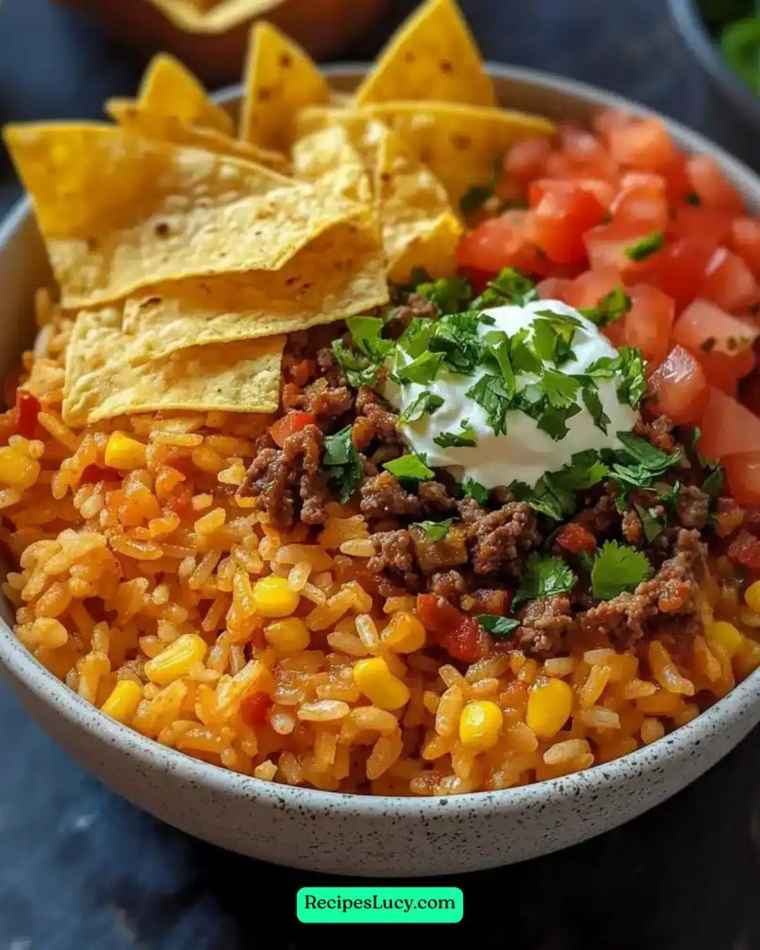 Taco Rice Bowl topped with Doritos for a crunchy flavor twist