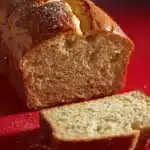 Sliced Christmas Eggnog Bread with festive decorations