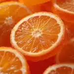 Delicious candied orange slices on a white plate