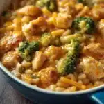 Cheesy broccoli chicken rice casserole baked to perfection in a dish.