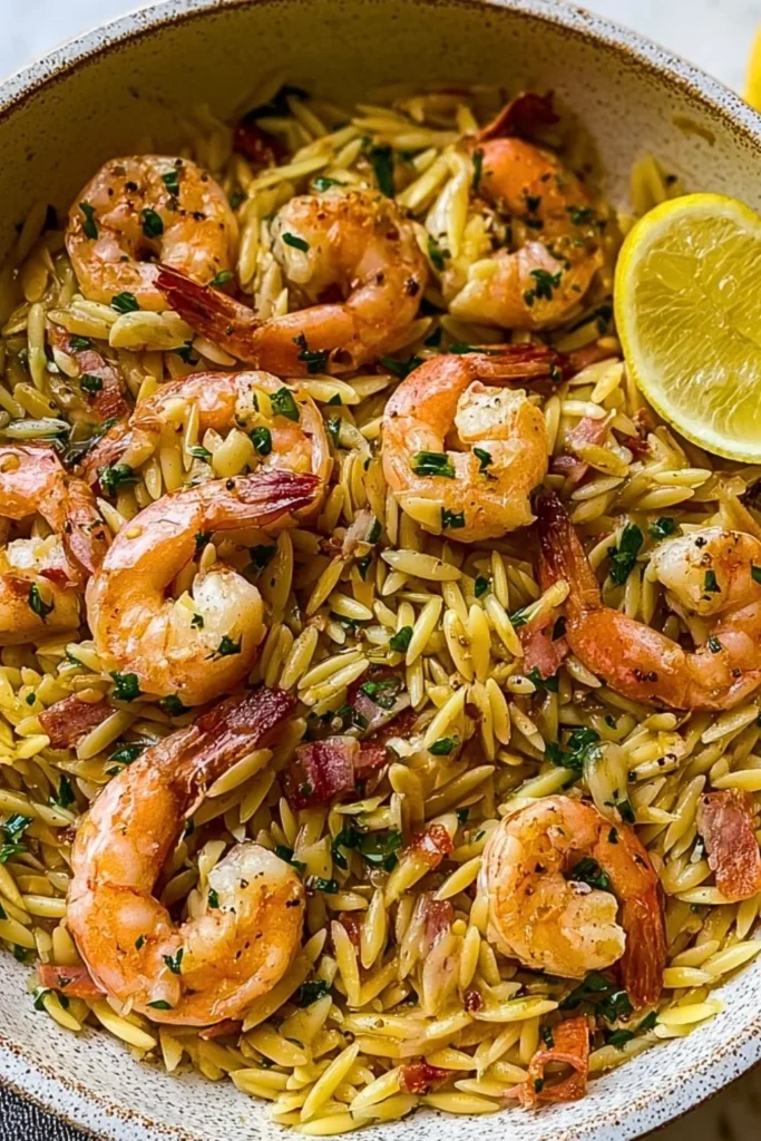 Plate of Garlic Butter Shrimp served with orzo pasta