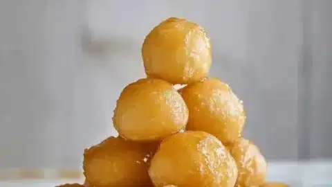Lenten Greek honey puffs drizzled with honey, a sweet dessert for celebrations.