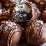 Delicious Peppermint Oreo Truffles decorated with crushed peppermint candy.