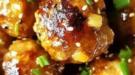 Savory Pineapple Teriyaki Meatballs served with a tropical glaze