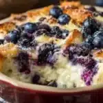 Delicious blueberry cottage cheese breakfast bake topped with fresh blueberries