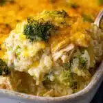 Cheesy Broccoli Chicken and Rice Casserole garnished with herbs