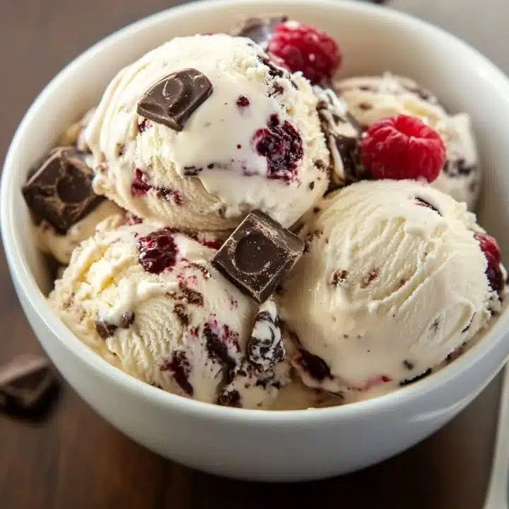 Delicious Cherry Garcia ice cream topped with cherries and chocolate flakes