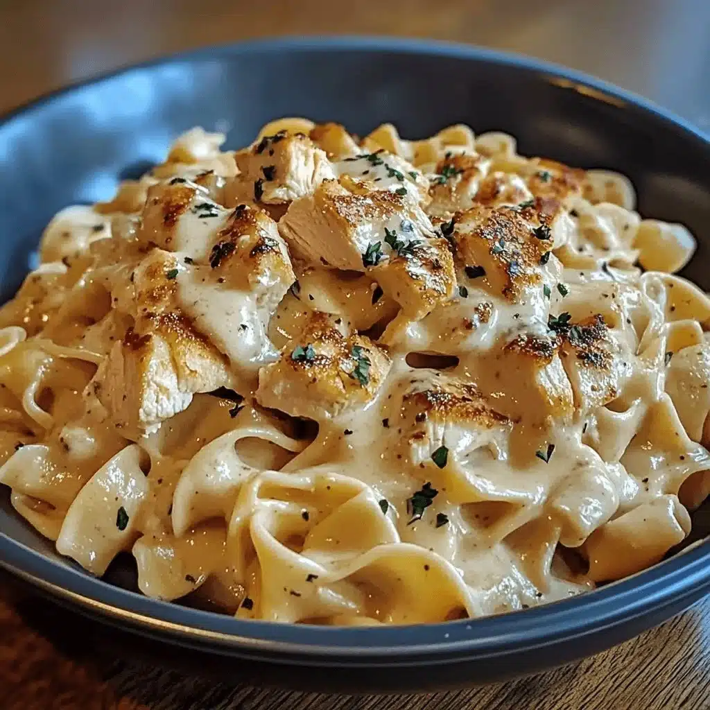 Delicious Chicken Buttered Noodles served with a creamy garlic sauce.