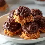 No-bake Chocolate Peanut Butter Haystacks dessert on a plate, ready to enjoy.