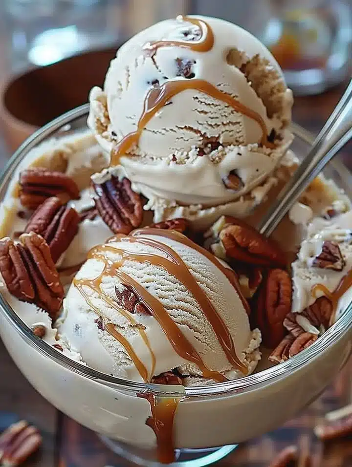 Delicious coffee ice cream with caramel swirl and toasted pecans