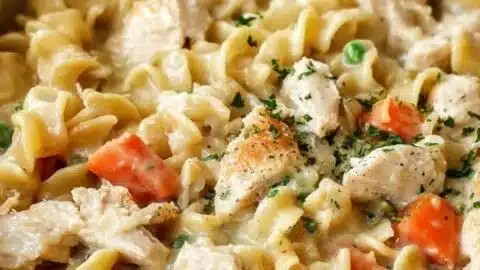Creamy Chicken Pot Pie Pasta dish with chicken, vegetables, and pasta in a creamy sauce.