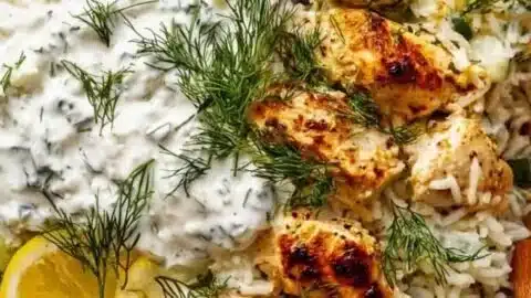 Delicious dump-and-bake chicken tzatziki rice dish on a plate