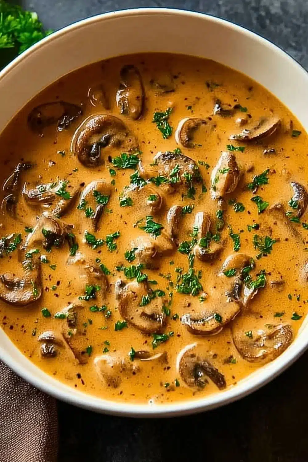 A serving of easy mushroom gravy over mashed potatoes for a delicious meal.