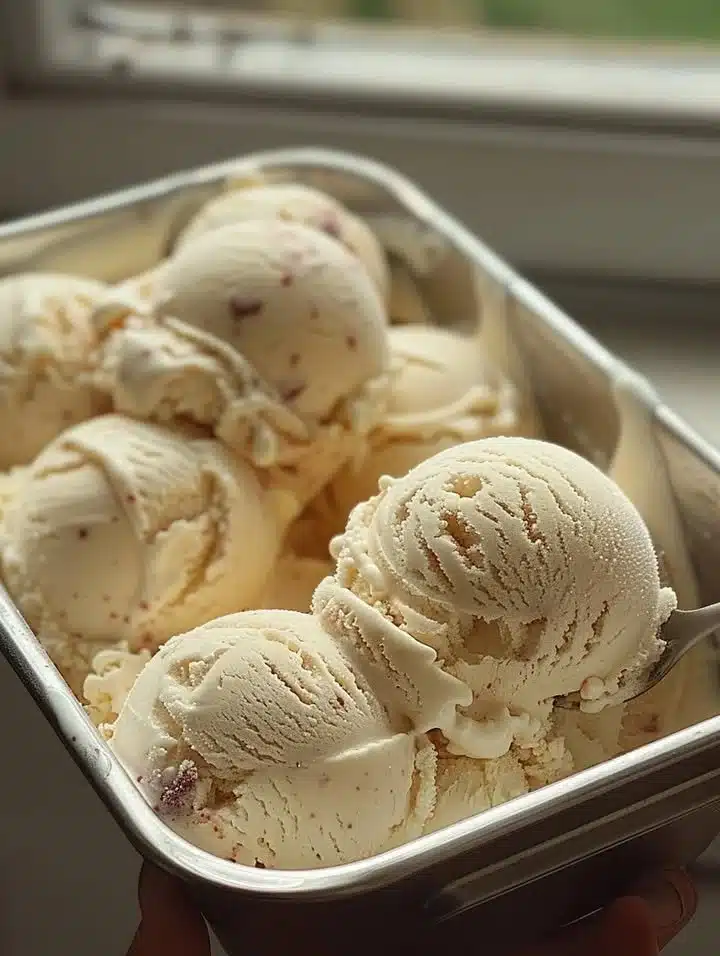 Delicious homemade ice cream served in a bowl with toppings