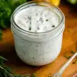 Homemade ranch dressing made with fresh herbs and ingredients in a bowl