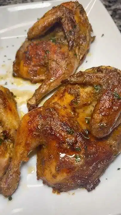 Delicious juicy oven baked Cornish hens ready to serve