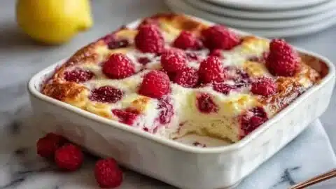 Lemon Raspberry Cottage Cheese Bake served on a white plate