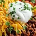 Loaded Potato Taco Bowl with toppings like cheese and avocado