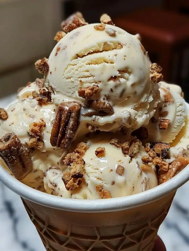 Malted milk toffee crunch ice cream featuring crunchy toffee bits and creamy texture