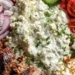 Delicious Mediterranean gyro bowls with fresh veggies and savory meat