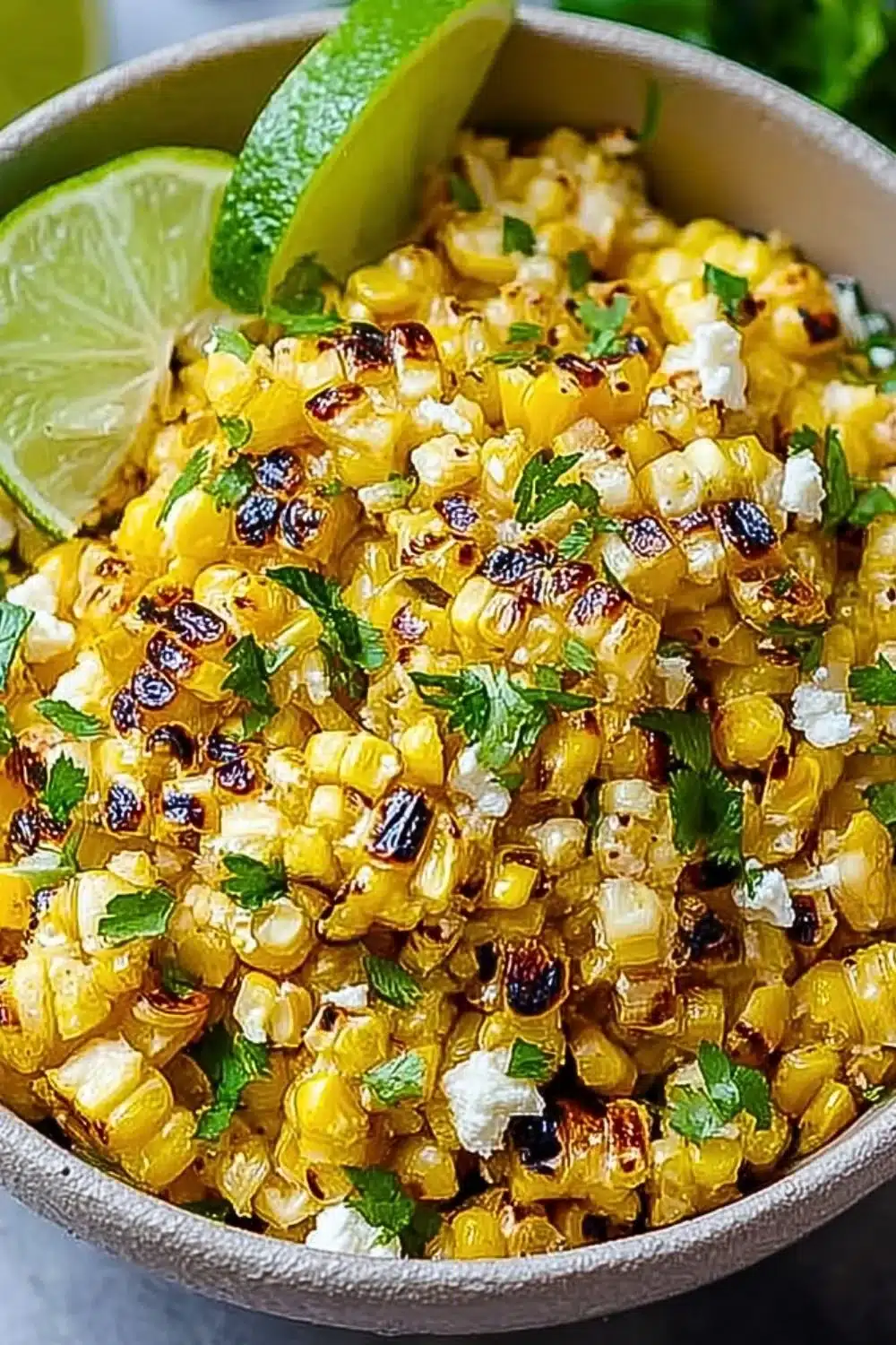 Delicious Mexican street corn salad with fresh corn, cheese, and spices