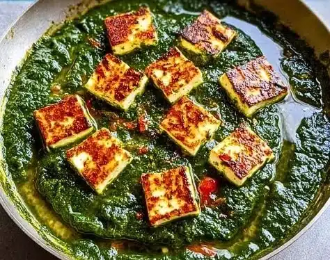 Creamy Spinach Cheese dip served in a bowl with fresh vegetables