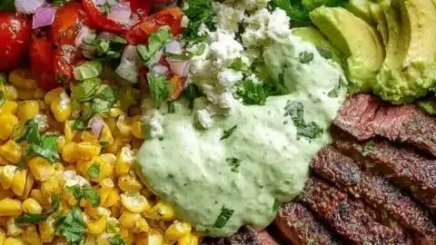 Steak Avocado Bowl with roasted corn and cilantro cream sauce