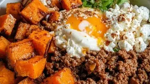 Delicious Sweet Potato Beef Bowl topped with Hot Honey and Cottage Cheese