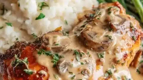 Delicious Texas Roadhouse Smothered Chicken with savory toppings