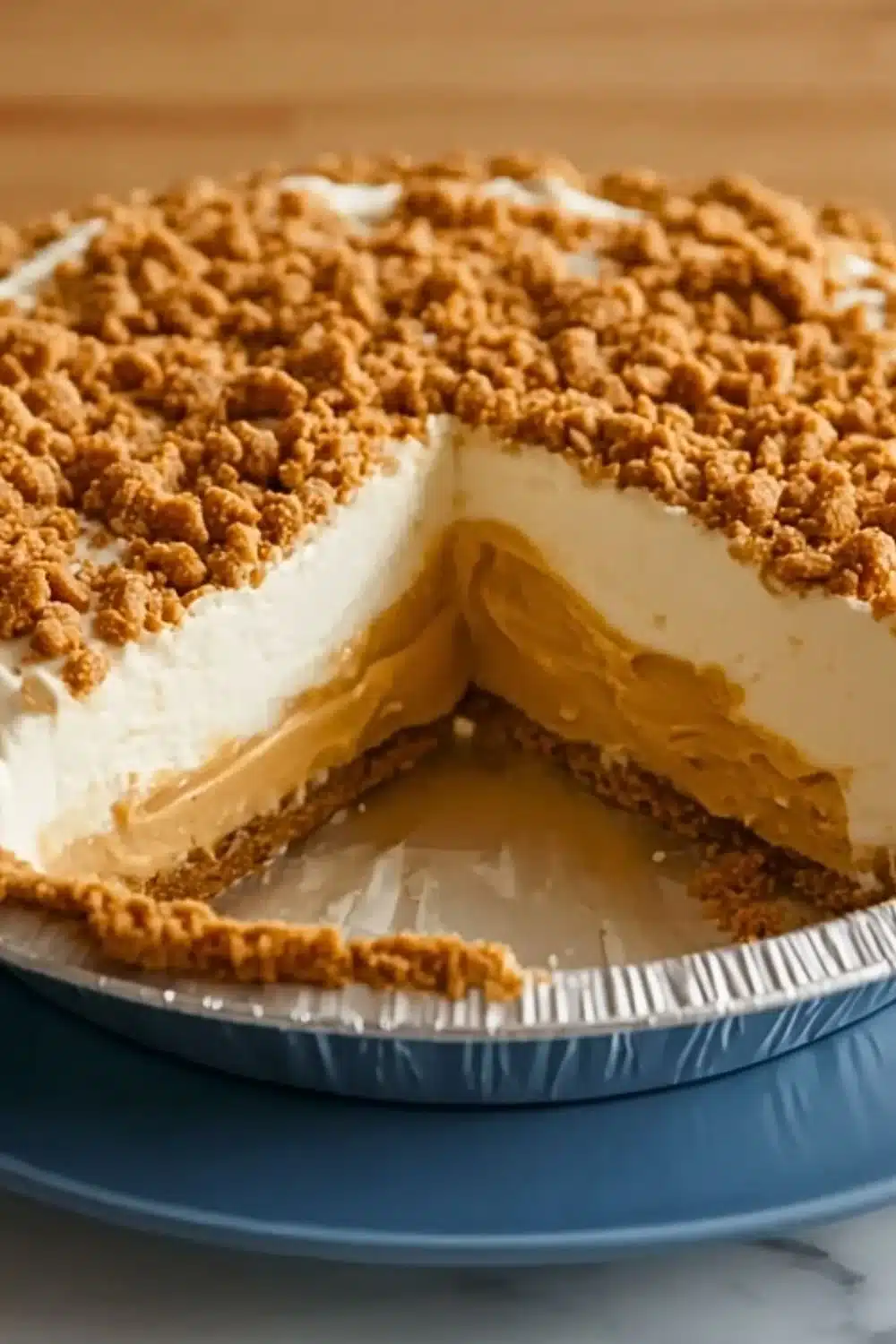 Delicious slice of best peanut butter pie with creamy filling and chocolate drizzle