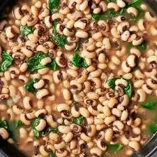 Black Eyed Peas performing live on stage at a concert.