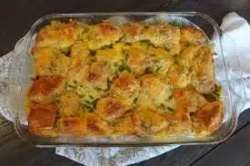 Breakfast casserole with biscuits, eggs, and cheese baked until golden brown