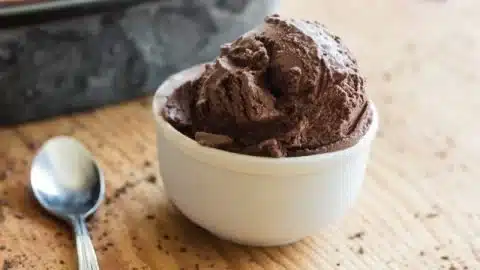 Dark chocolate coconut cream ice cream topped with chocolate drizzle