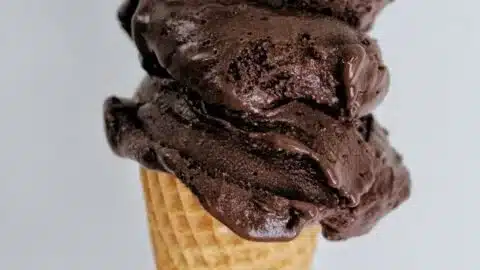 Delicious dark chocolate gelato in a bowl, showcasing its creamy texture.