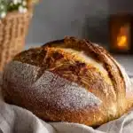 Festive eggnog sourdough bread loaf with holiday decorations