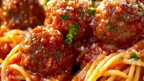 Delicious plate of spaghetti and meatballs in rich tomato sauce