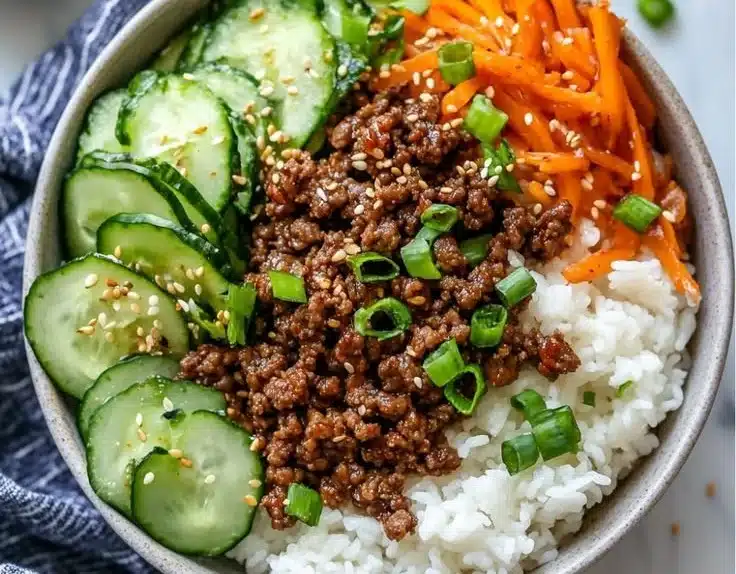 Delicious Korean Ground Beef Bowl with marinated beef and fresh vegetables