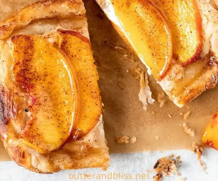 Mini Peach and Cream Cheese Tarts with fresh peaches on a flaky crust