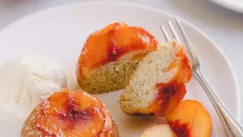 Delicious Peach Upside Down Mini Cakes displayed on a dessert table