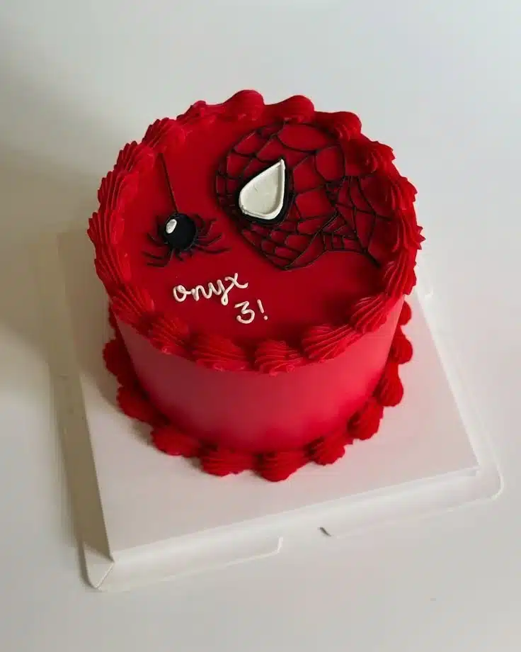 Delicious Spiderman birthday cake decorated with superhero theme
