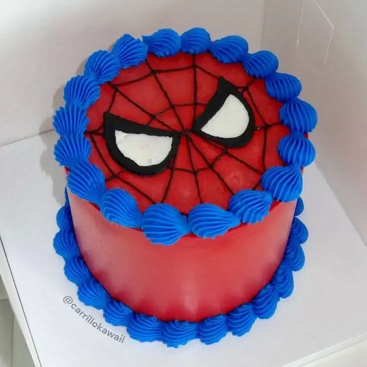 Bright and detailed Spiderman cake with web design for superhero-themed celebrations