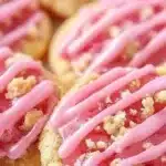 Freshly baked Strawberry Crunch Cookies with a crispy topping