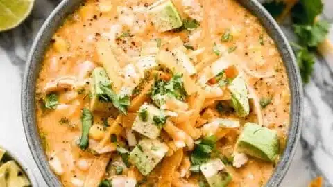 Bowl of creamy white chicken chili topped with cilantro