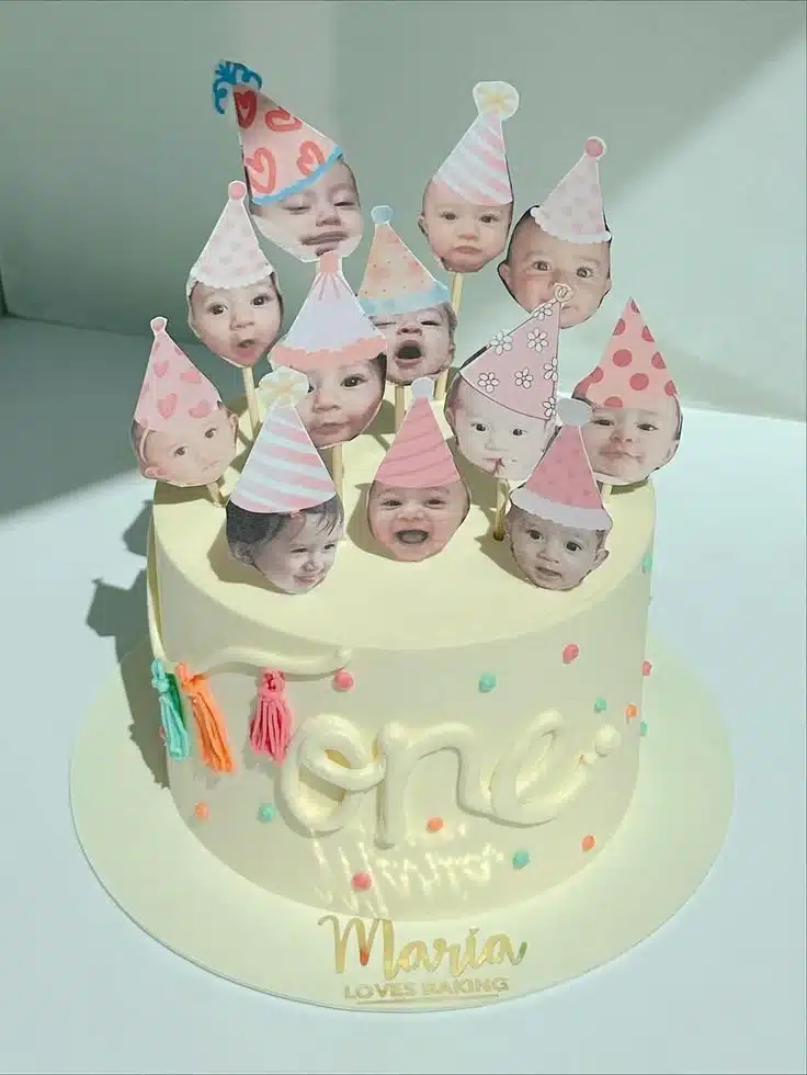 Delicious chocolate birthday cake with colorful candles and decorations