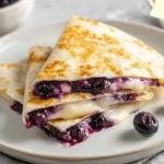 Blueberry Breakfast Quesadilla with melted cheese and fresh blueberries